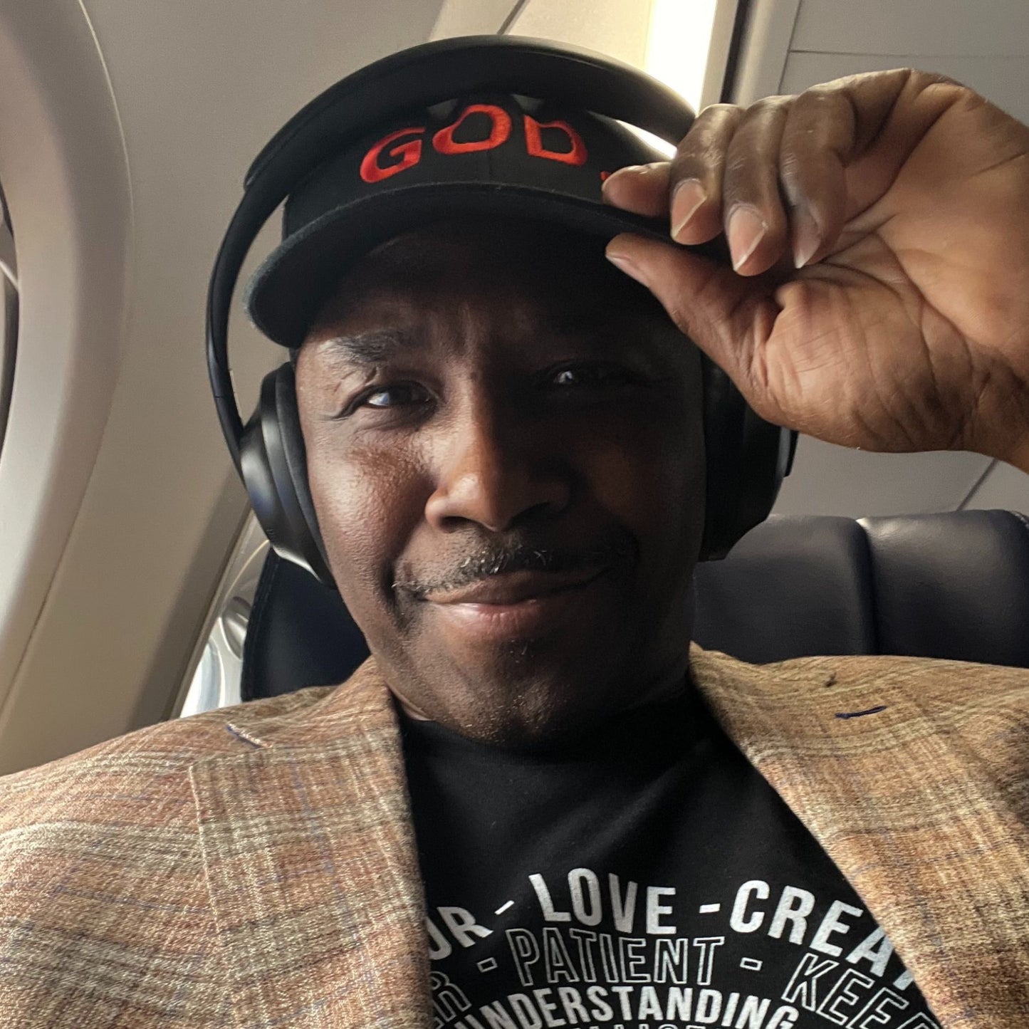 God Works trucker cap worn — front view — D&B Originals