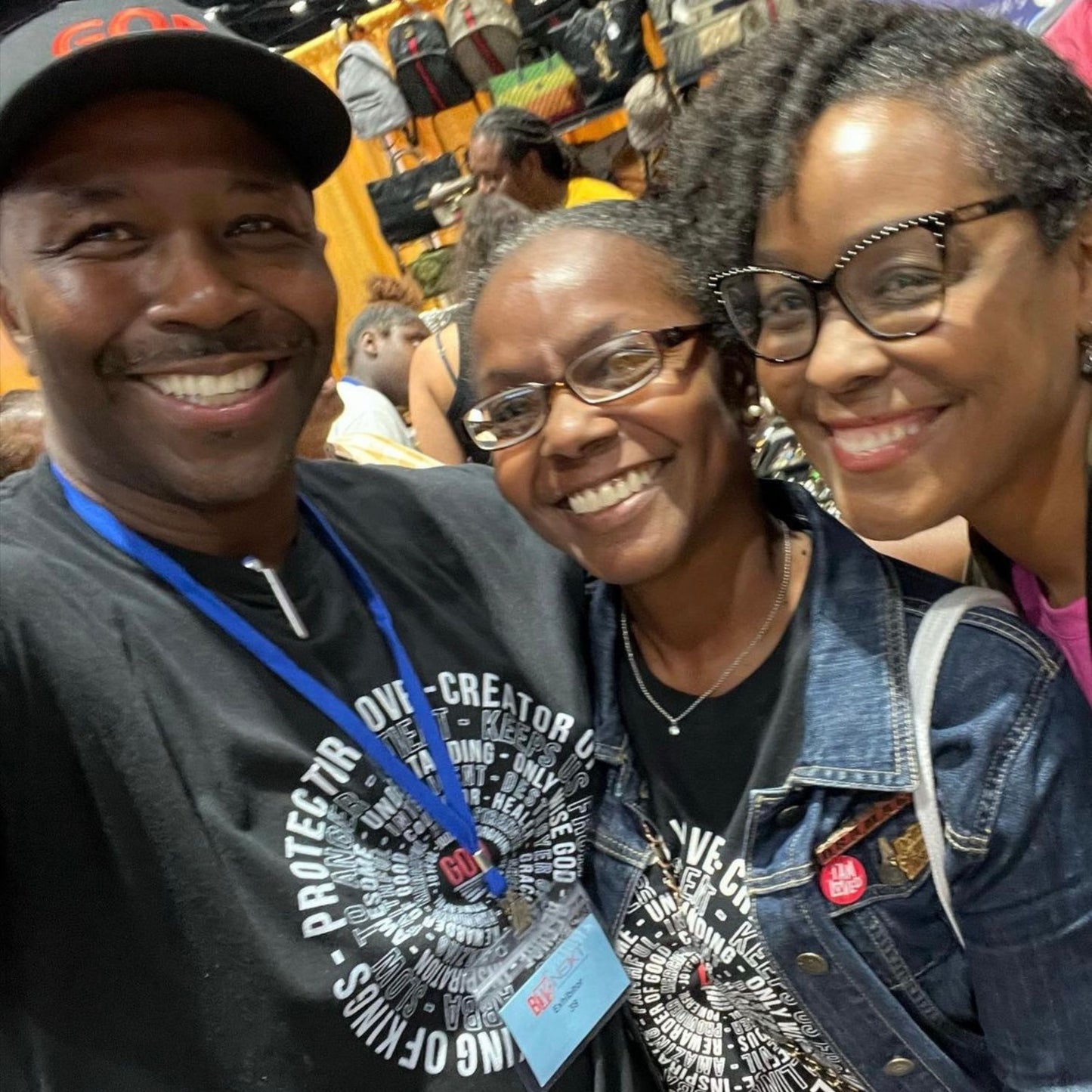 Community wearing God Works shirts at event – D&B Originals